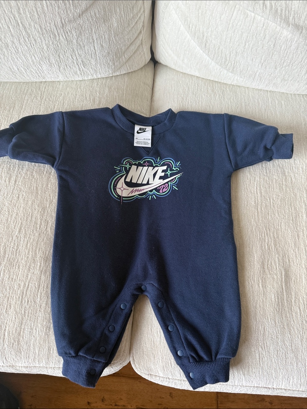 Nike Navy Infant One-Piece Footie with Colorful Logo